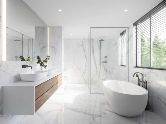 modern wite bathroom with white marble anf bthtub