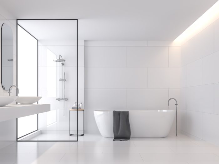 Großes Minimalismus-Bad mit freistehender Badewanne