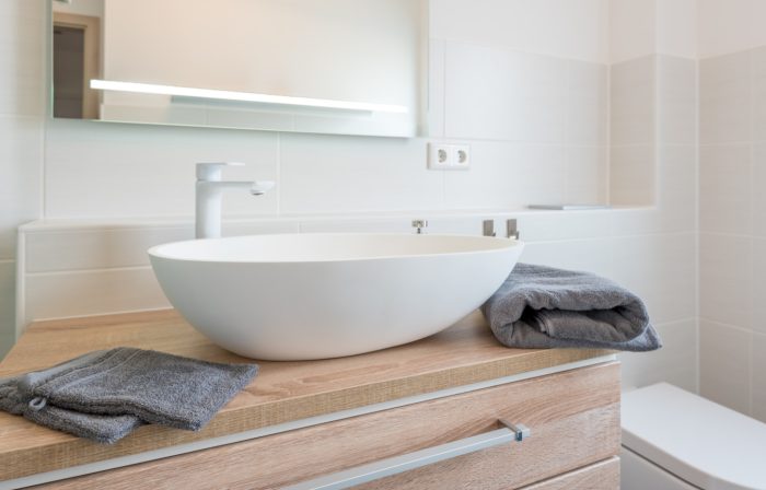 Gäste-WC richtig gestalten – 7 Ideen für eine einladende Atmosphäre 10 Waschbecken mit Textilien